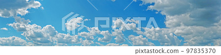 Blue sky with fluffy clouds wide background Blue sky with fluffy clouds wide background 97835370