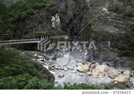 Dark river in taroko national park after rain storm in taiwan. Dark river in taroko national park after rain storm in taiwan. 97836415