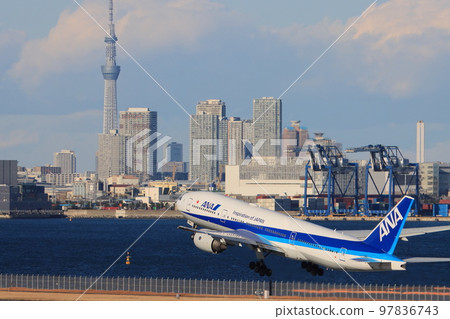 Passenger plane taking off with Tokyo Skytree in the background Jet plane taking off from Haneda Airport 97836743