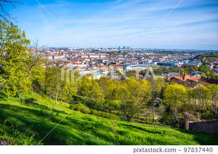 Sunny spring day in Petrin Gardens with Prague city lookout, Czech Republic 97837440