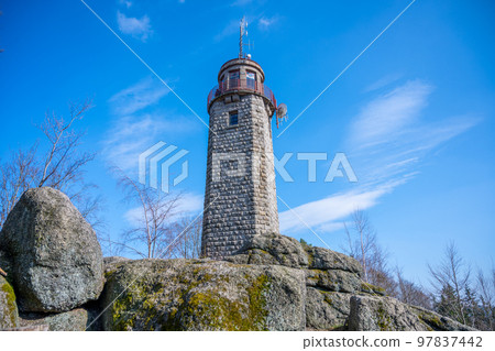 Old stone lookout tower on Prosec Ridge near Jablonec nad Nisou, Jizera Mountains, Czech Republic 97837442