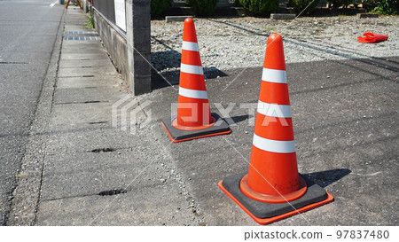 Pylon placed in parking lot Pylon placed in parking lot 97837480