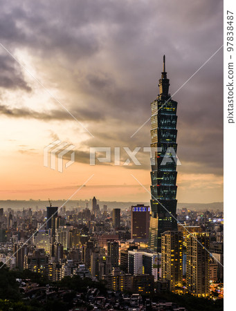 Sunset view of Taipei from the top of the mountain in Taipei Taiwan. Taipei 101 Skyscrapers, and other modern buildings of downtown. Sunset view of Taipei from the top of the mountain in Taipei Taiwan. Taipei 101 Skyscrapers, and other modern buildings of downtown. 97838487