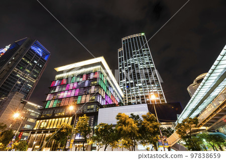 Night view of modern buildings in Xinyi District, Taipei, Taiwan. the District is Taipei's main shopping area, anchored by several department stores and malls. 97838659