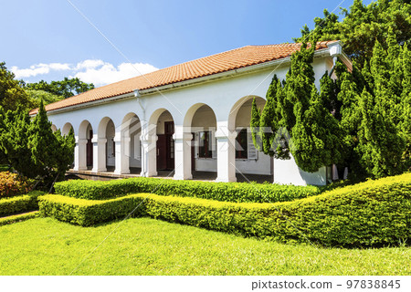 View of Former Tamsui Customs Officer's Residence in New Taipei City, Taiwan. It's a white building built in a U.K colonial style nicknamed Little White House. 97838845