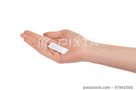 Woman holding suppository on white background. Hemorrhoid problems 97842008