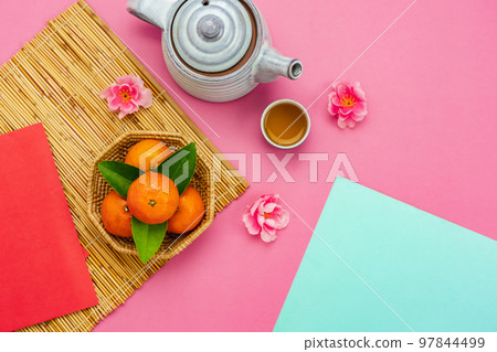 Chinese language mean rich or wealthy and happy.Top view aerial image decoration Chinese new year lunar new year holiday background concept.Flat lay red orange with blossom on modern paper. Chinese language mean rich or wealthy and happy.Top view aerial image decoration Chinese new year lunar new year holiday background concept.Flat lay red orange with blossom on modern paper. 97844499