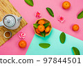 Chinese language mean rich or wealthy and happy.Top view aerial image decoration Chinese new year  lunar new year holiday background concept.Flat lay red orange with blossom on modern  paper. 97844501