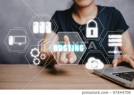 Web hosting concept, Woan using computer and presses his finger on the virtual screen inscription Hosting on desk, Internet, business, Technology and network concept. 97844706