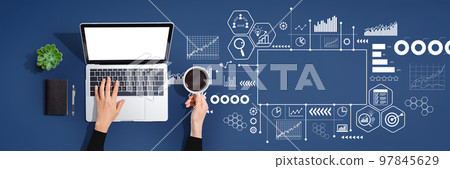 Business theme with person using laptop computer Business theme with person using laptop computer 97845629