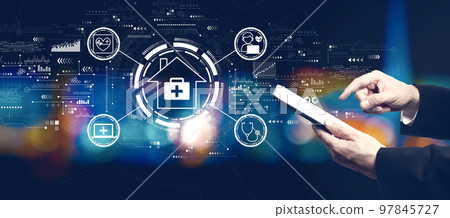 Telehealth theme with businessman using a tablet computer 97845727