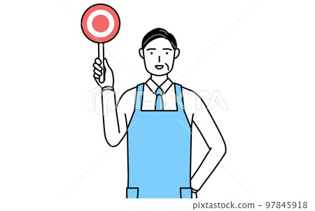 A senior man wearing an apron with a circle stick showing the correct answer A senior man wearing an apron with a circle stick showing the correct answer 97845918