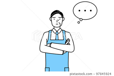 A senior man wearing an apron thinking with his arms crossed 97845924