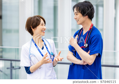 Young doctors and nurses working in a medical facility Young doctors and nurses working in a medical facility 97846515