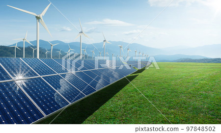 Solar panels and wind generators under blue sky 97848502