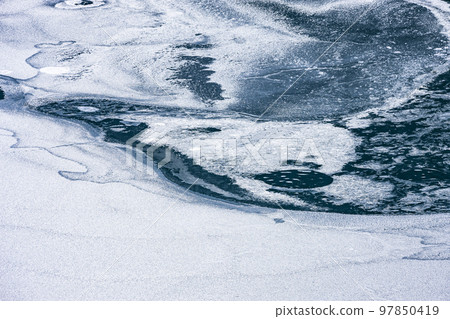Frozen lake surface 97850419