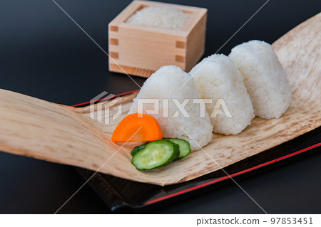 Rice ball Black background Close-up Japanese food image material Rice ball Black background Close-up Japanese food image material 97853451