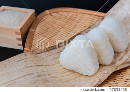 Rice ball Black background Close-up Japanese food image material Rice ball Black background Close-up Japanese food image material 97853468