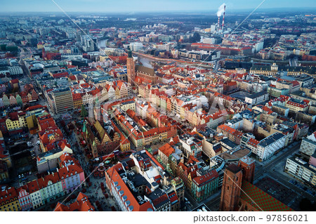 Wroclaw Rynek Square, aerial view. View from above on main market square in Wroclaw with walking tourists during Christmas holidays. Wroclaw Rynek Square, aerial view. View from above on main market square in Wroclaw with walking tourists during Christmas holidays. 97856021
