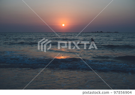 Itoshima, Fukuoka Prefecture Sunset and sunset over the Genkai Sea from the Keya Surf Point on Heinohama, where there are many surfers 97856904
