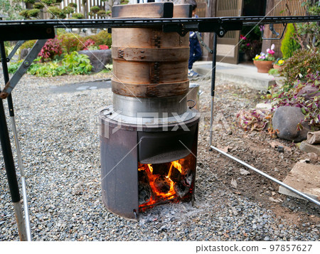 Japanese traditional bonfire stand for making rice cakes Japanese traditional bonfire stand for making rice cakes 97857627