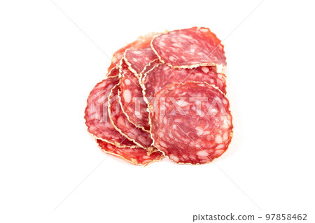 Slices of salami sausage on a white background Slices of salami sausage on a white background 97858462