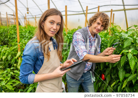 Agricultural scientists posing for the camera at work 97858734