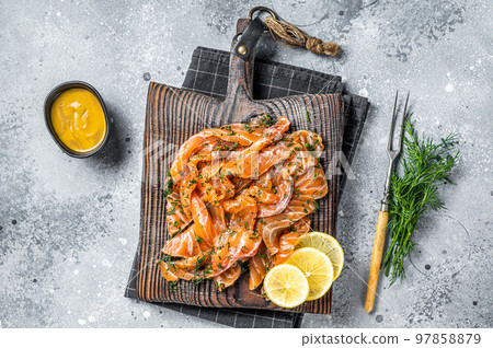Gravlax Cured Salmon fillet with dill, salt and papper, lox. Gray background. Top view 97858879