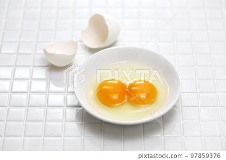 Two yellow eggs 97859376
