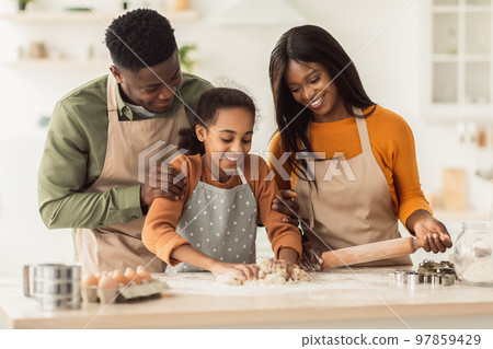 Black Family Kneading Dough Baking Together Making Cookies In Kitchen 97859429