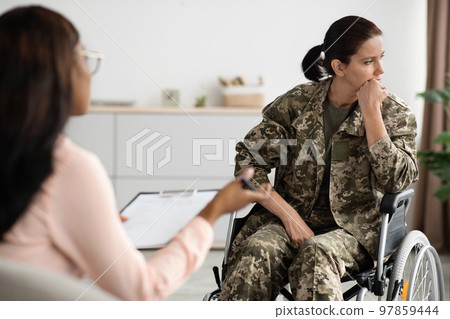 Disabled Female Soldier In Wheelchair Having Psychotherapy Session, 97859444