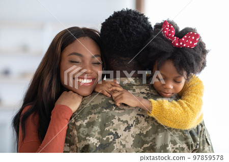 Happy Reunion. Joyful Wife And Daughter Hugging Military Man, Closeup Happy Reunion. Joyful Wife And Daughter Hugging Military Man, Closeup 97859578