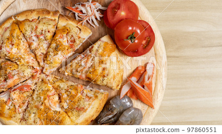 Homemade Seafood Pizza, Hot pizza big slices of cheese for lunch or dinner topped with Seafood Sauce, Template with delicious, Promotional poster for restaurant or pizza sale, Text space. Homemade Seafood Pizza, Hot pizza big slices of cheese for lunch or dinner topped with Seafood Sauce, Template with delicious, Promotional poster for restaurant or pizza sale, Text space. 97860551
