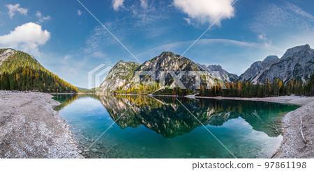 Autumn peaceful alpine lake Braies or Pragser Wildsee. Fanes-Sennes-Prags national park, South Tyrol, Dolomites Alps, Italy, Europe. Picturesque traveling, seasonal and nature beauty concept scene. 97861198