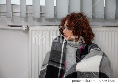Tired of waiting for the girl to start the central heating. 97861280