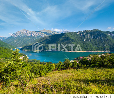 Piva Lake (Pivsko Jezero) and Pluzine town view in Montenegro. Piva Lake (Pivsko Jezero) and Pluzine town view in Montenegro. 97861301