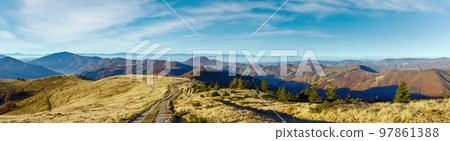 Rural road in autumn mountain. Rural road in autumn mountain. 97861388