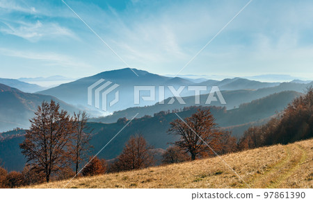 Autumn misty mountain landscape. Autumn misty mountain landscape. 97861390