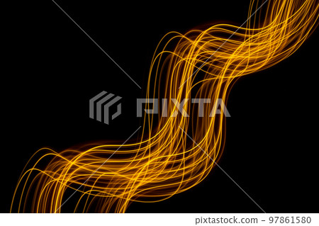Abstract technology banner design. Long exposure light painting. Vibrant digital yellow neon lines on black background. Abstract technology banner design. Long exposure light painting. Vibrant digital yellow neon lines on black background. 97861580