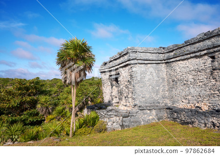 Ruins of Tulum, pre Columbian Mayan city situated on cliffs along the east coast of the Yucatan Peninsula on the Caribbean Sea, Mexico. Ruins of Tulum, pre Columbian Mayan city situated on cliffs along the east coast of the Yucatan Peninsula on the Caribbean Sea, Mexico. 97862684