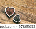 frame from gummy candies of worms on a wooden base, the basis for design 97865032