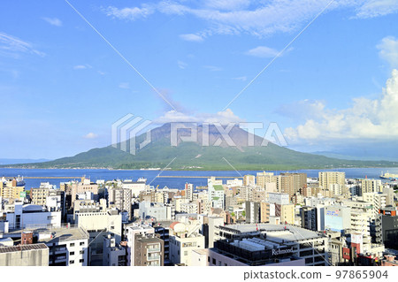 Sakurajima and city area from Kagoshima City Center Terrace Tenmonkan 97865904