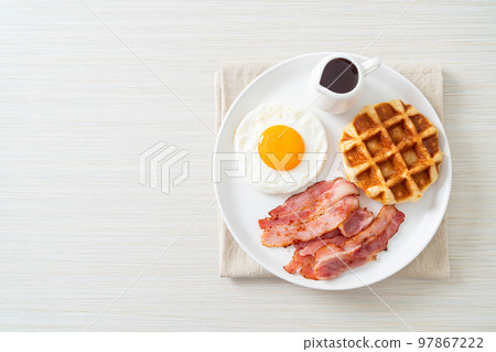 fried egg with bacon and waffle 97867222
