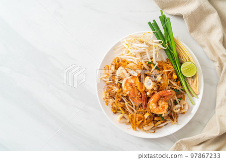 Pad Thai Seafood - Stir fried noodles with shrimps, squid or octopus and tofu Pad Thai Seafood - Stir fried noodles with shrimps, squid or octopus and tofu 97867233