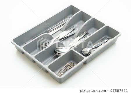 Kitchen box with cutlery for spoons, forks, knifes on white background Kitchen box with cutlery for spoons, forks, knifes on white background 97867821