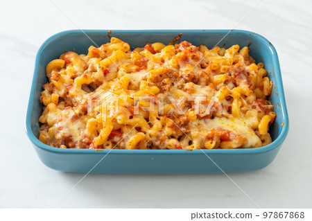 homemade macaroni bolognese with cheese 97867868
