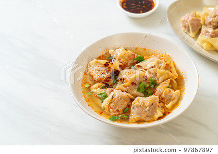 pork wonton soup or pork dumplings soup with roasted chili 97867897