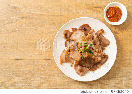 grilled pork neck sliced on plate grilled pork neck sliced on plate 97868040
