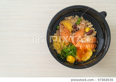grilled salmon with brown rice donburi 97868636