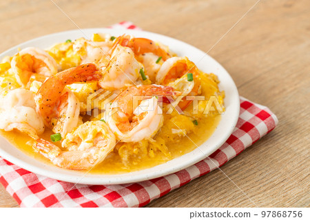 creamy omelet with shrimps or scrambled eggs and shrimps 97868756